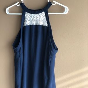 Navy blue sleeveless blouse with zipper and detail